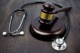 What qualifications should I look for in a medical malpractice lawyer in 2024?